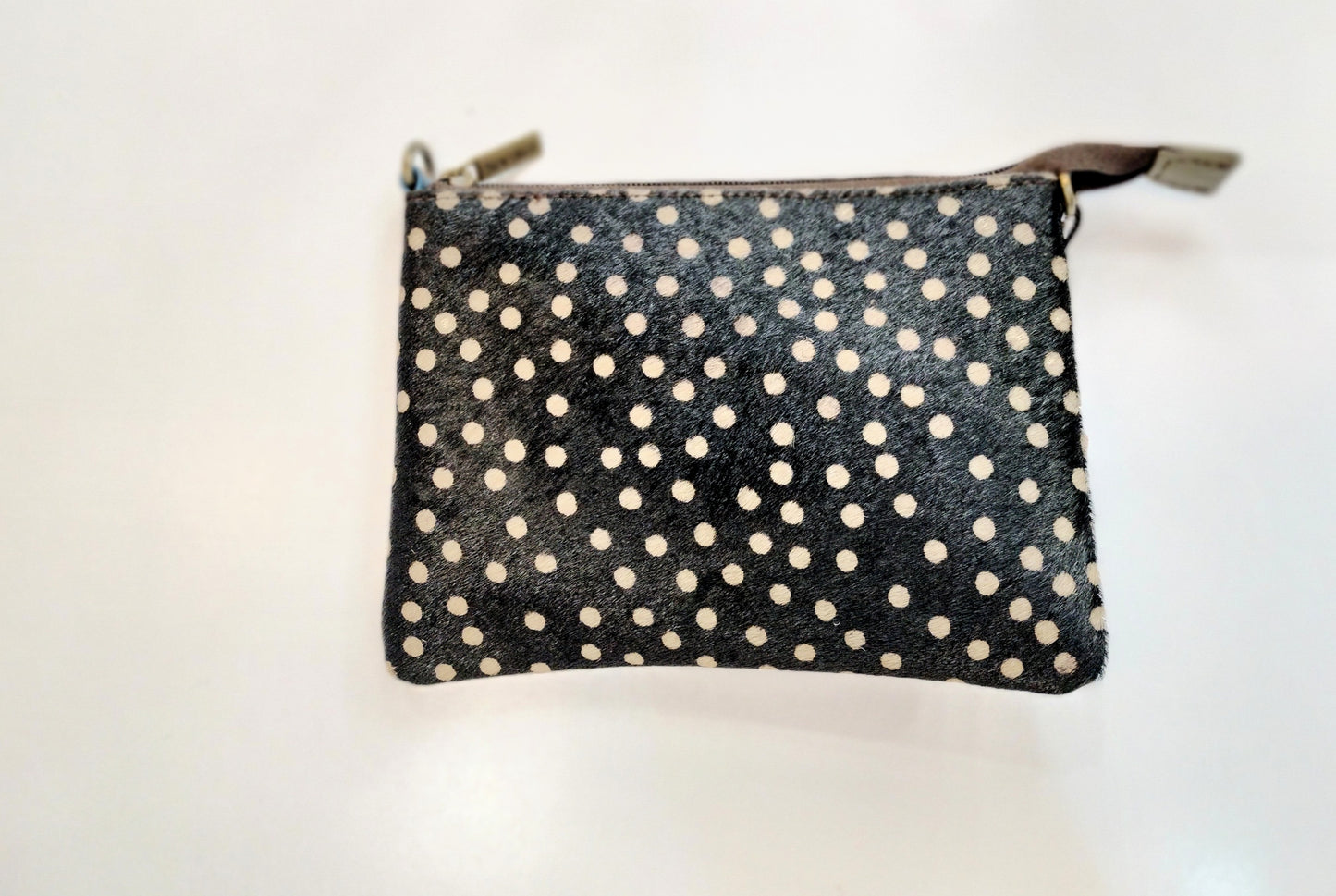 Bolso y clutch Cindy - animal print marrón y negro