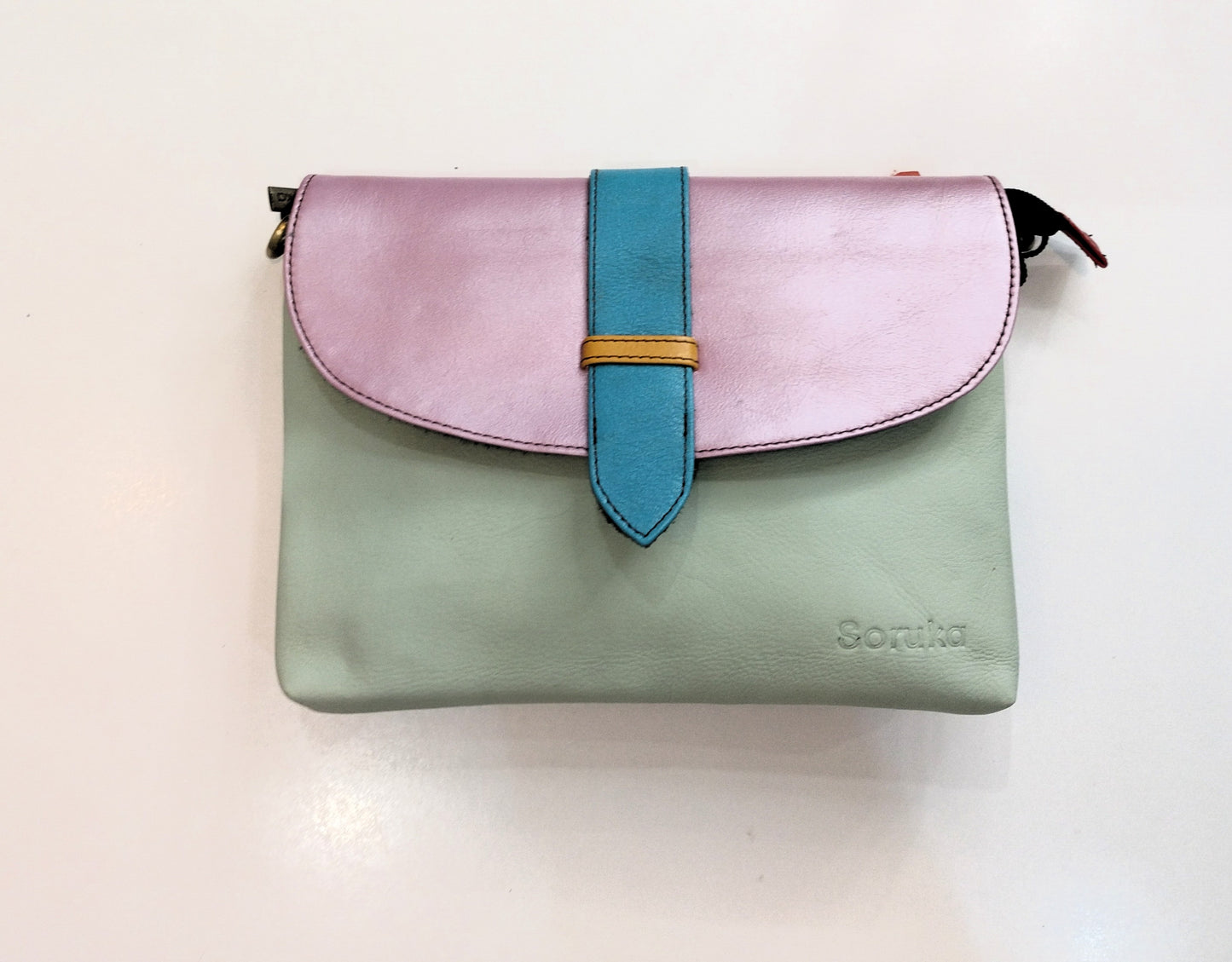 Bolso bandolera y clutch Saddle - liso