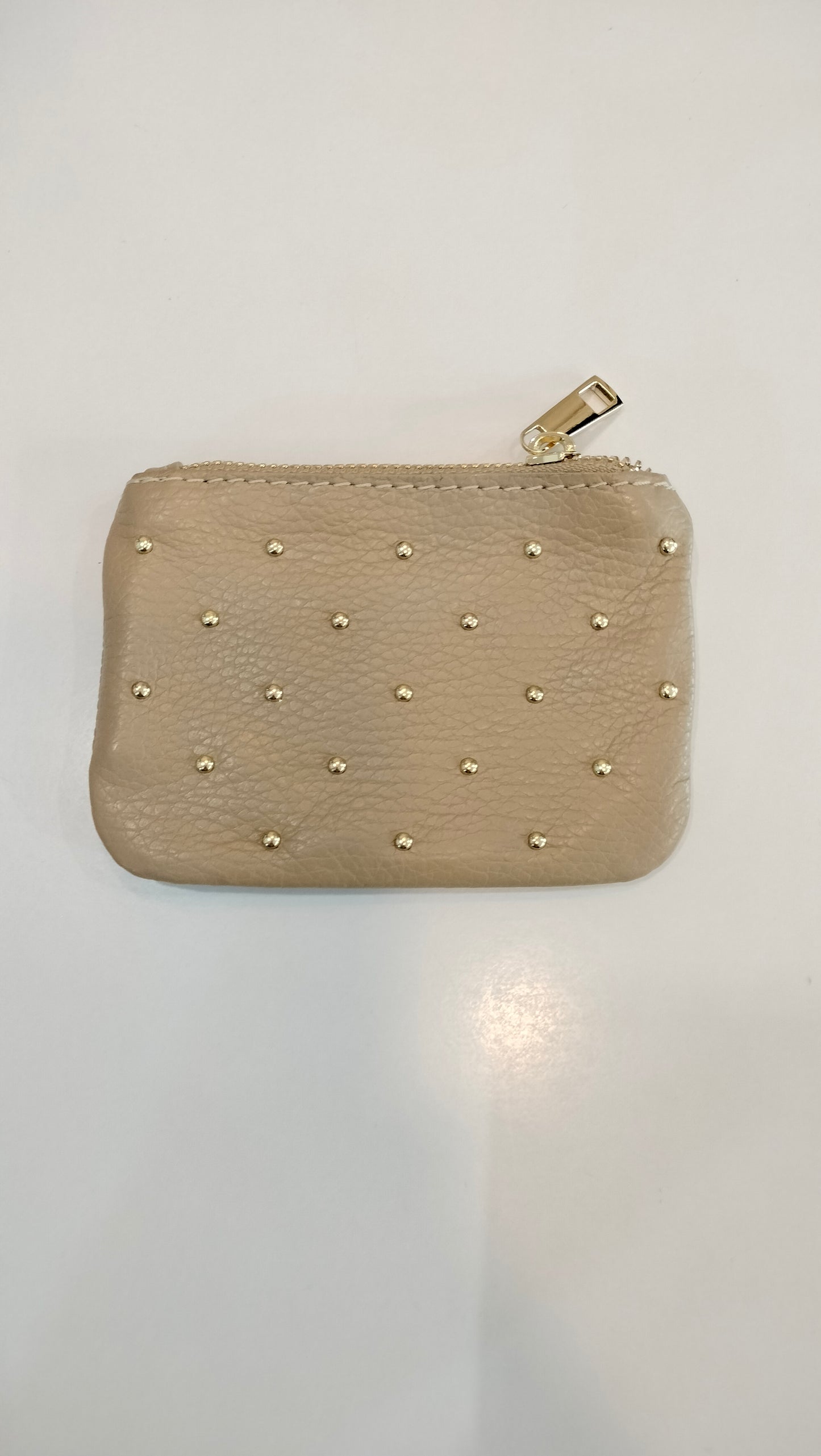Monedero tachas