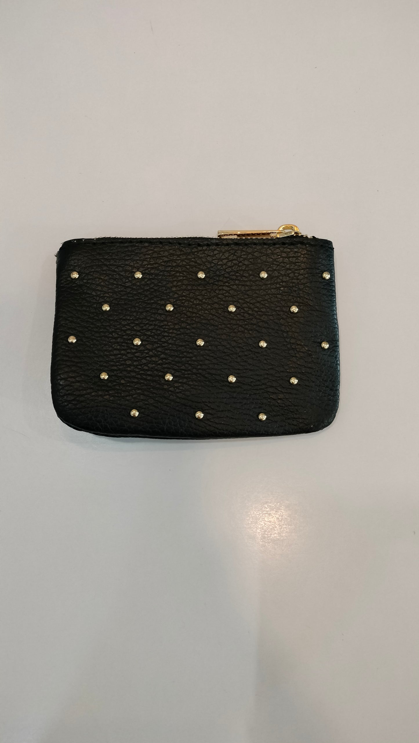 Monedero tachas
