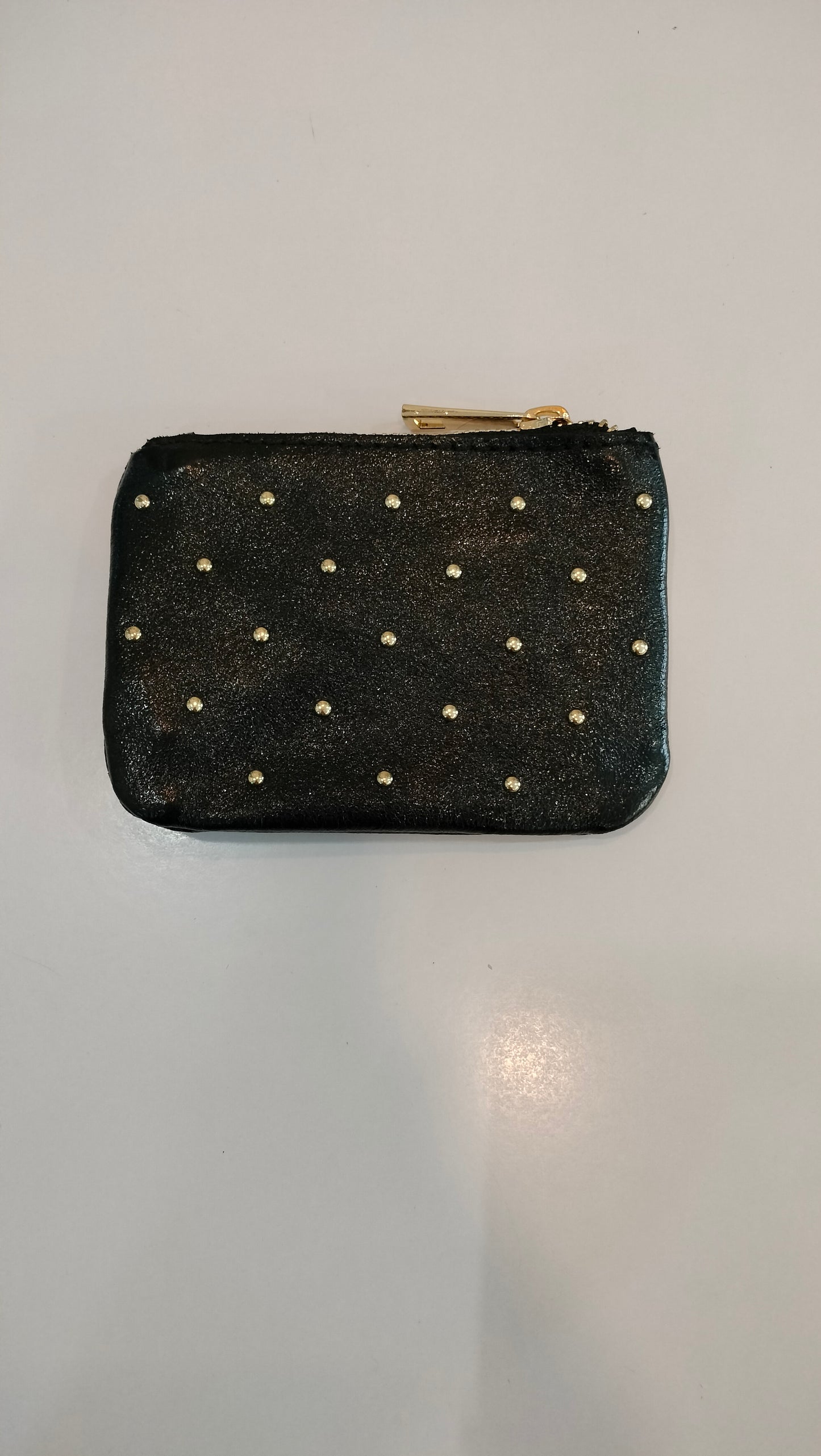 Monedero tachas