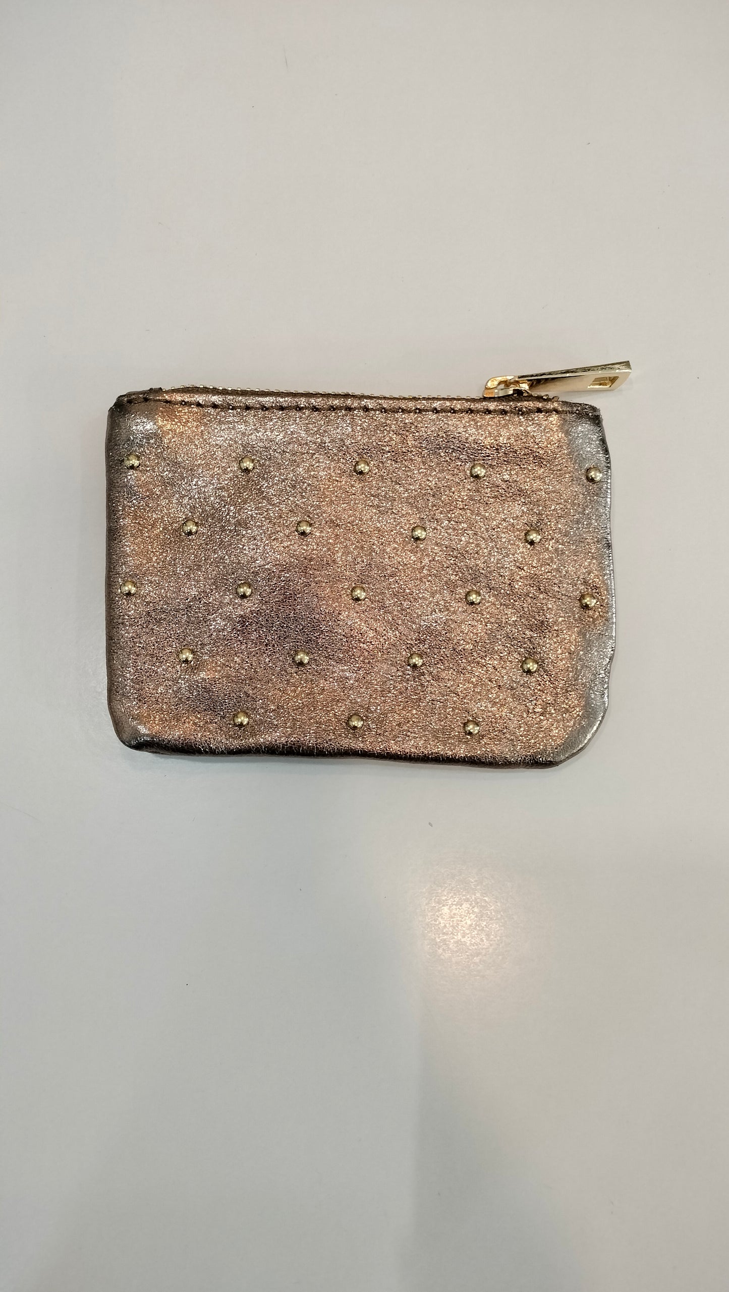 Monedero tachas