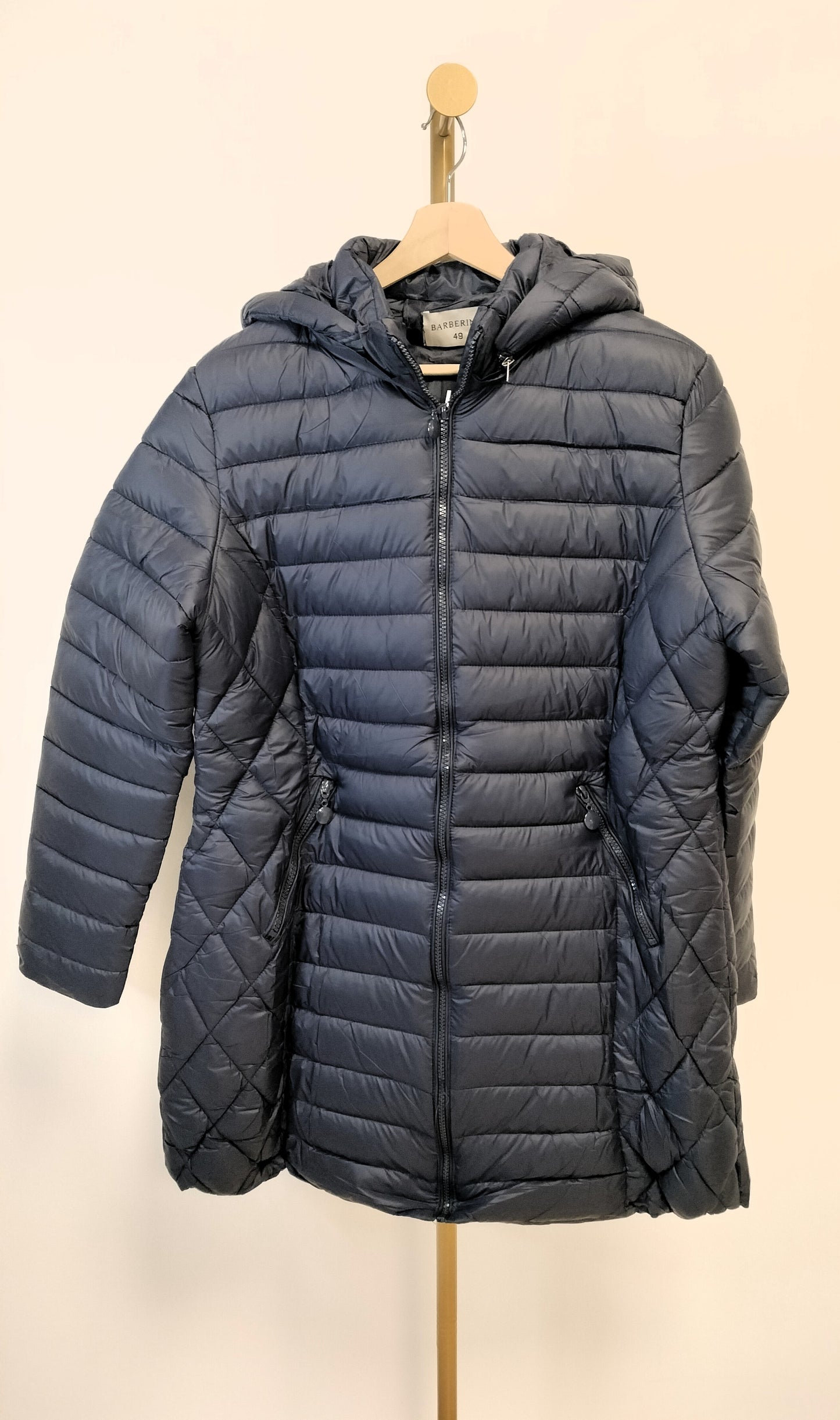 Abrigo capucha desmontable